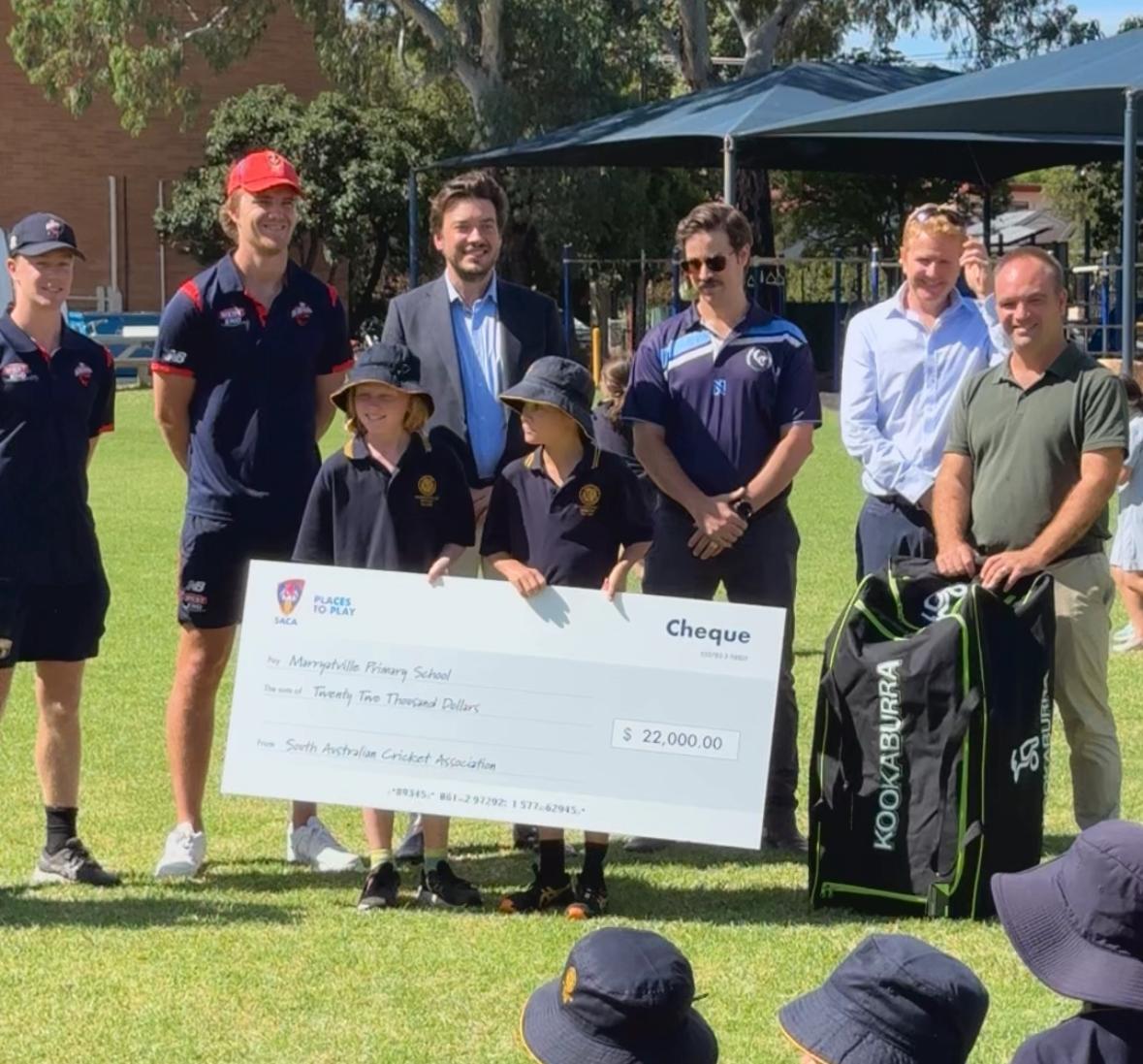 A big cheque for a new cricket pitch at Marryatville Primary School!